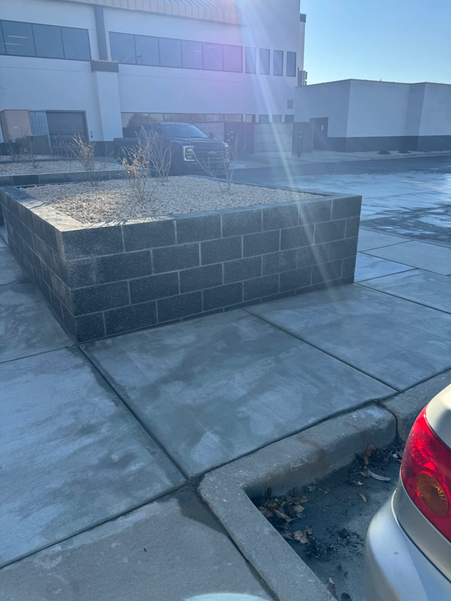 Commercial concrete parking lot installation by EC Landscaping Northern Utah