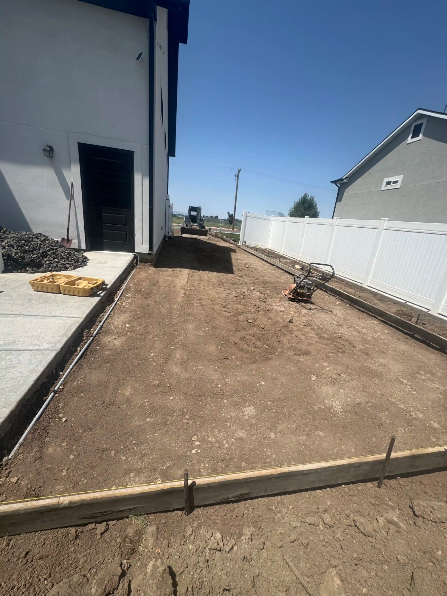Concrete site preparation with professional concrete forms by EC Landscaping in Clearfield Utah