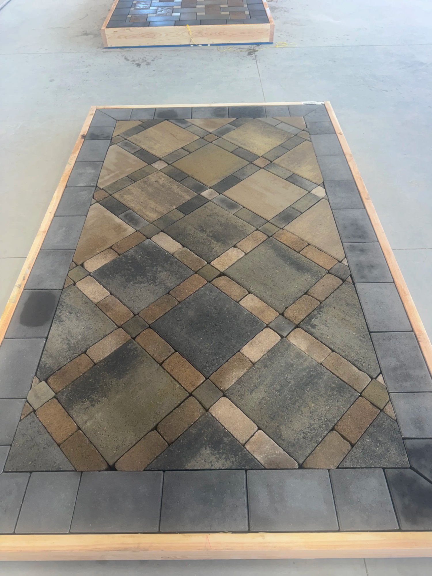 Diagonal multicolor paver patio pattern by EC Landscaping Northern Utah