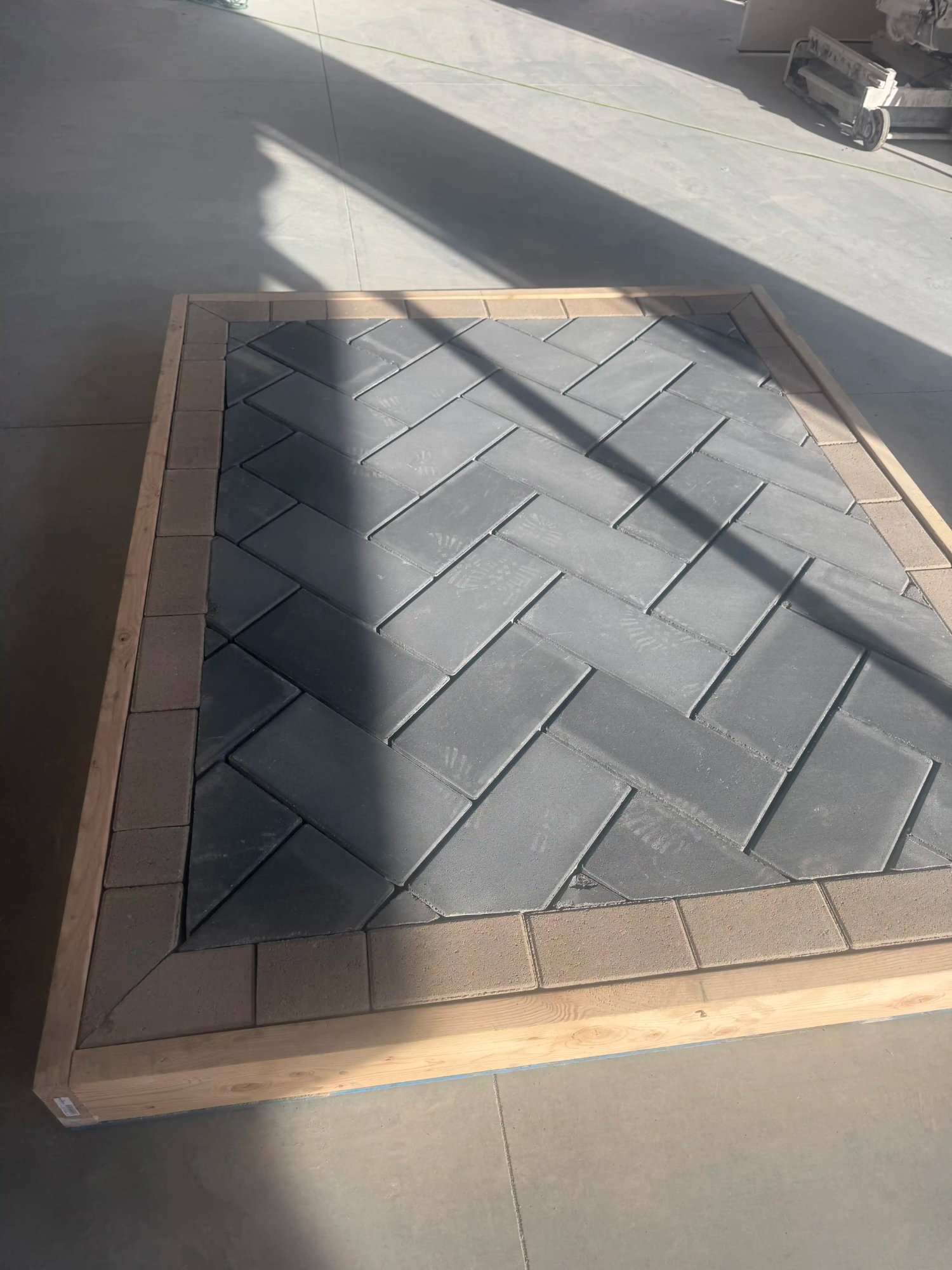 Herringbone charcoal paver pattern by EC Landscaping Northern Utah