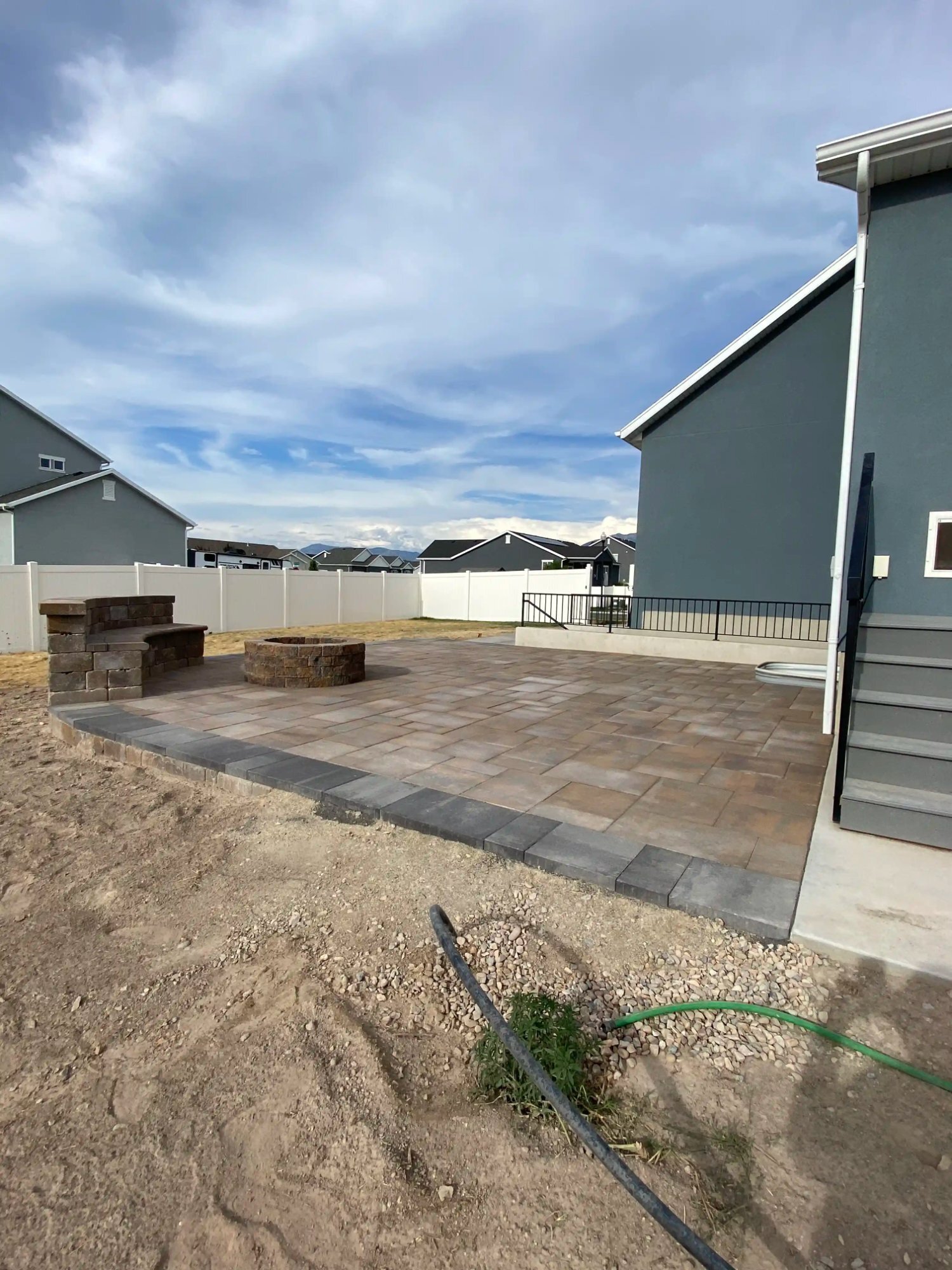 Paver fire-pit area with seating wall