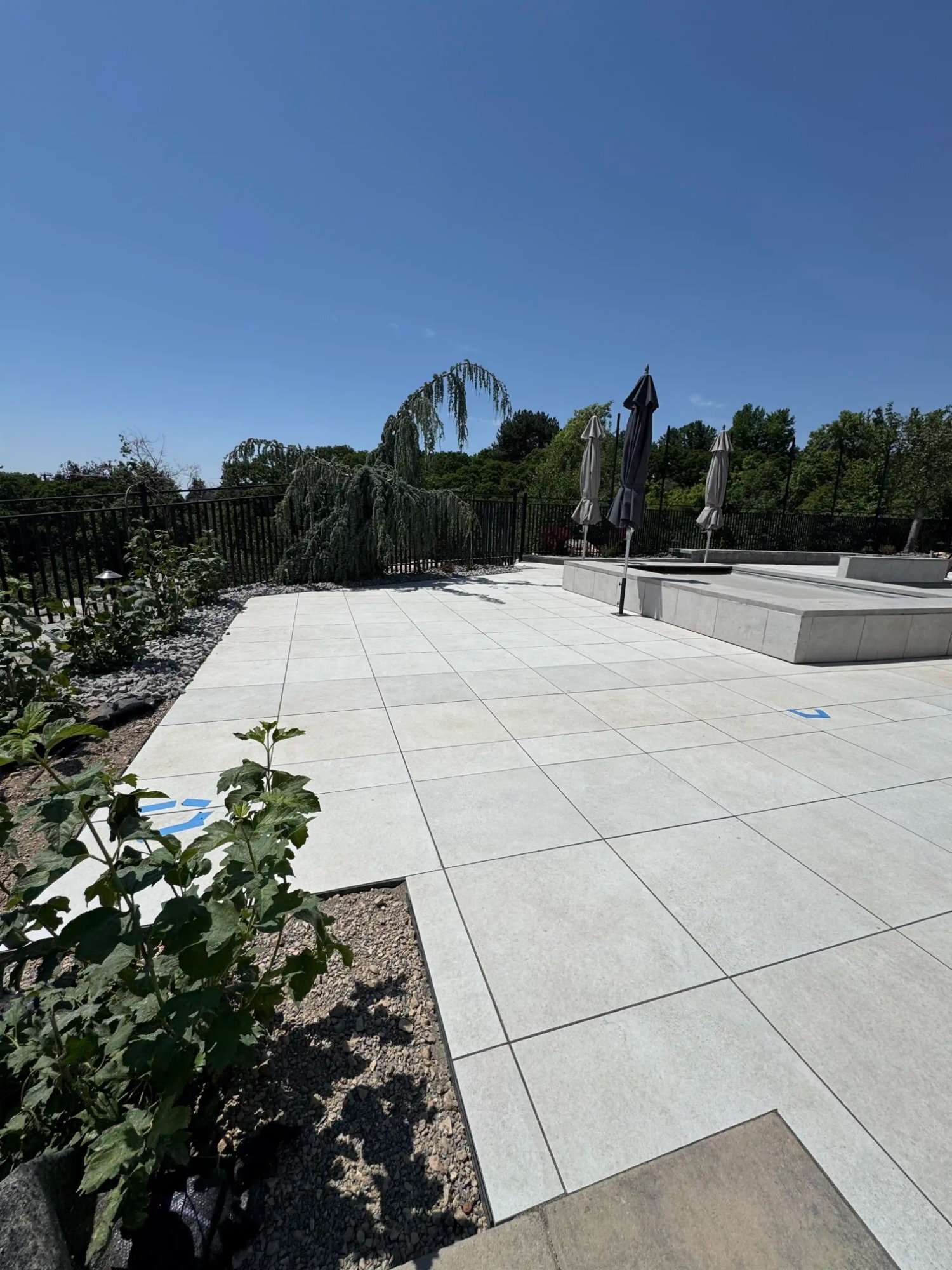 Luxury pool surround paver patio