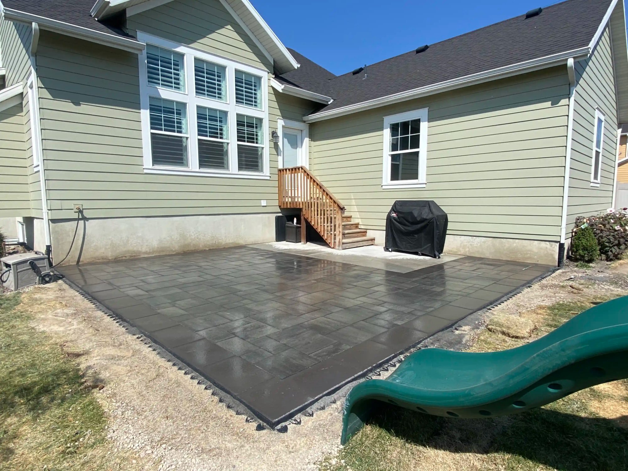 Dark charcoal paver patio residential Utah