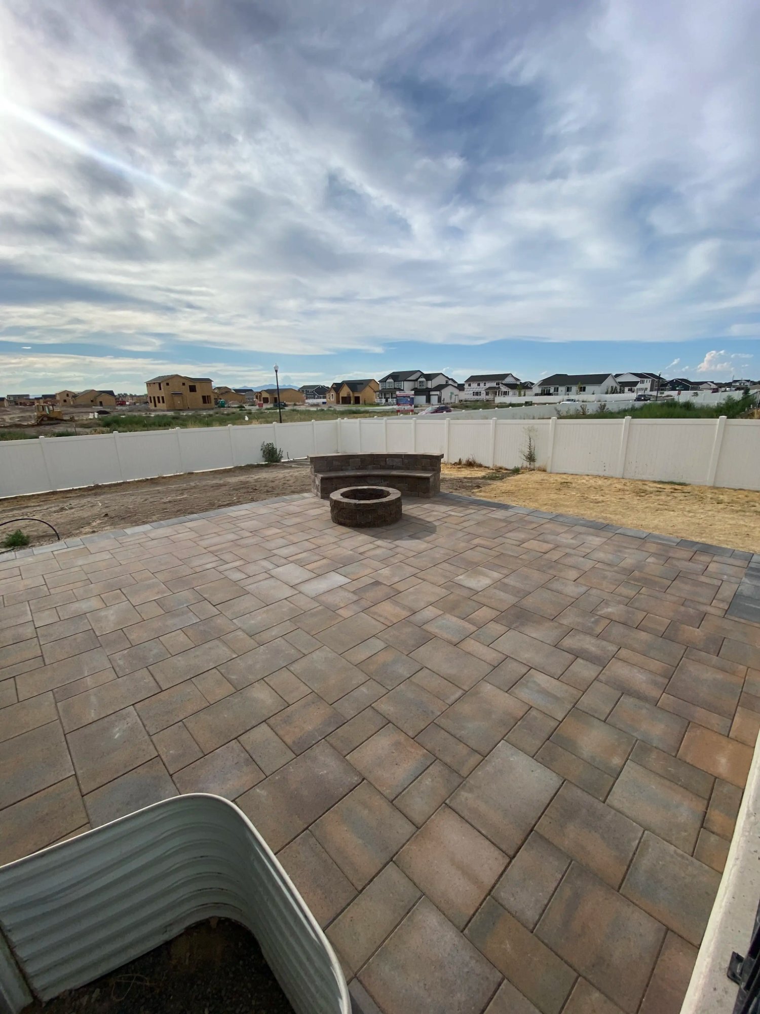 Overhead view fire pit paver patio Northern Utah