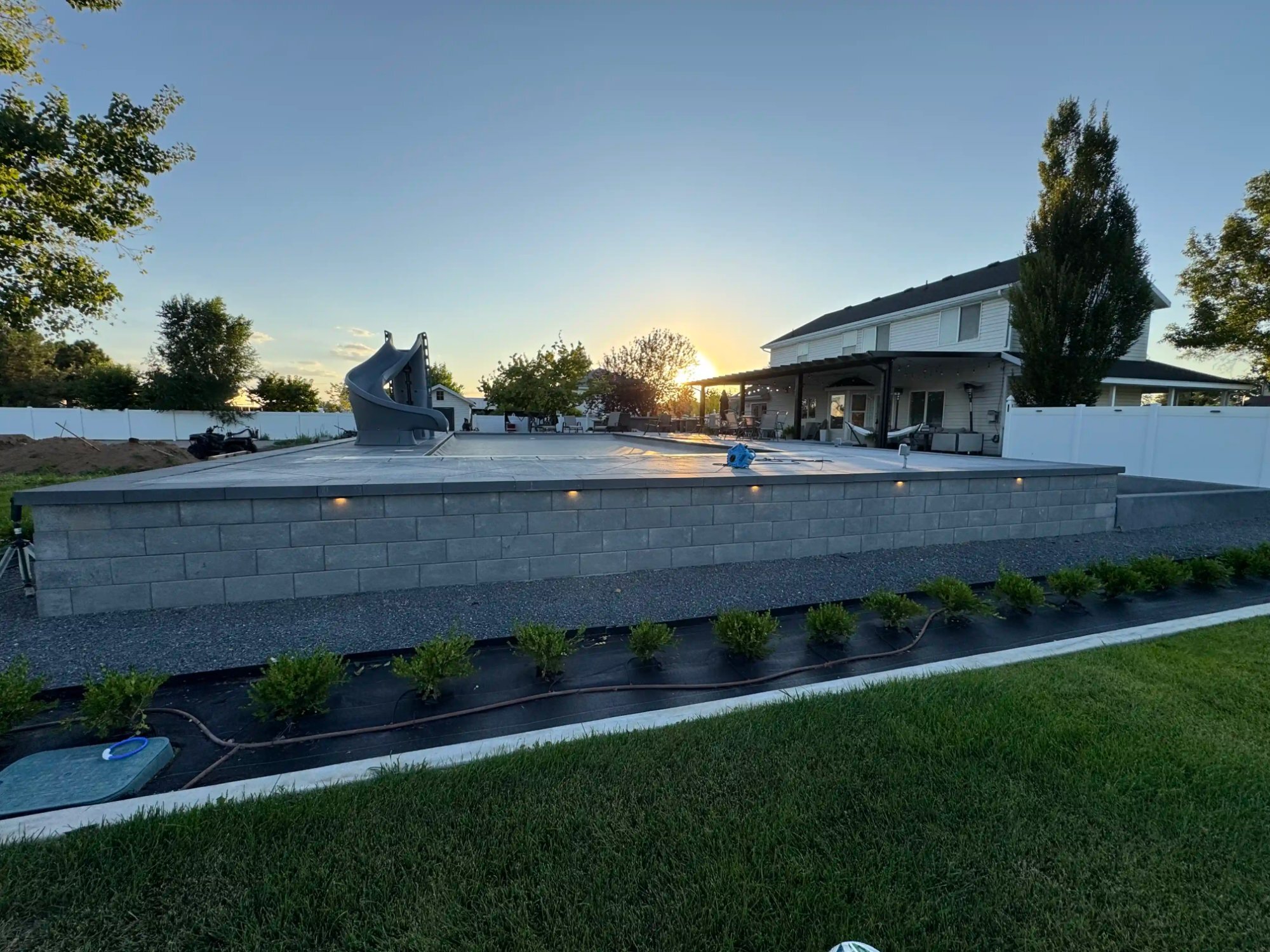 Pool deck retaining wall finished sunset