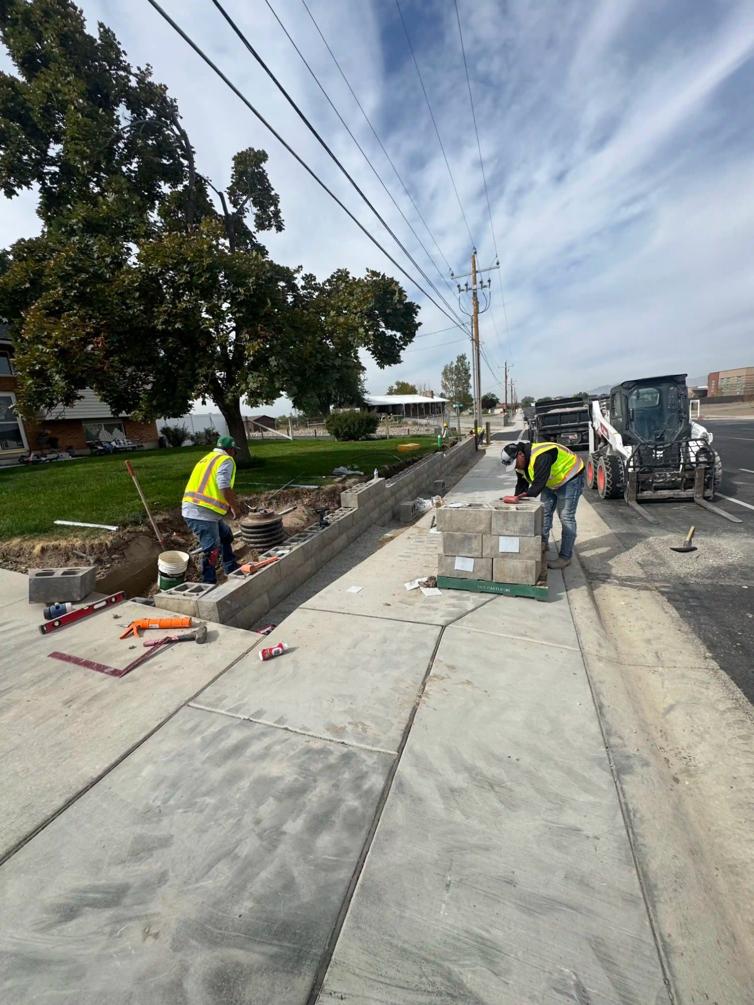Commercial CMU roadside retaining wall wide view Utah